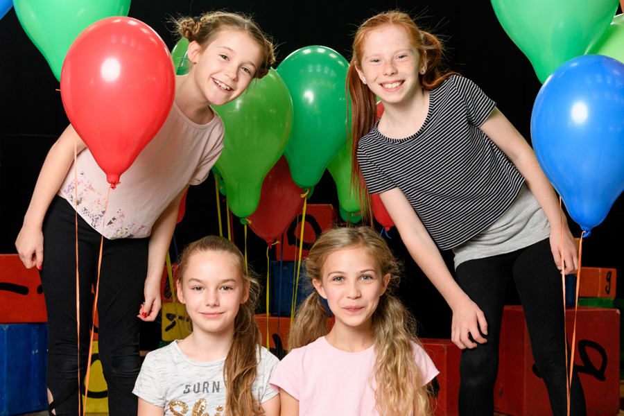 Lily-Mae Evans, Emma Moore, Kitty Peterkin and Savannah Read star in Matilda The Musical in the West End (Photo: Manuel Harlan)