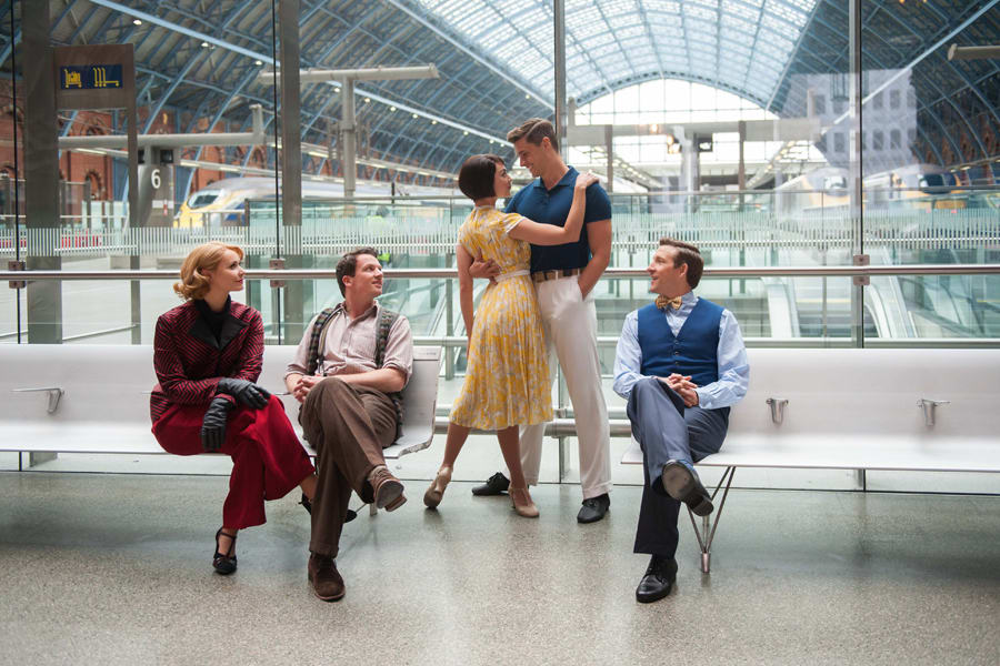 The cast of An American In Paris at St Pancras International station